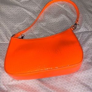 A orange shein purse I don’t want it nomo